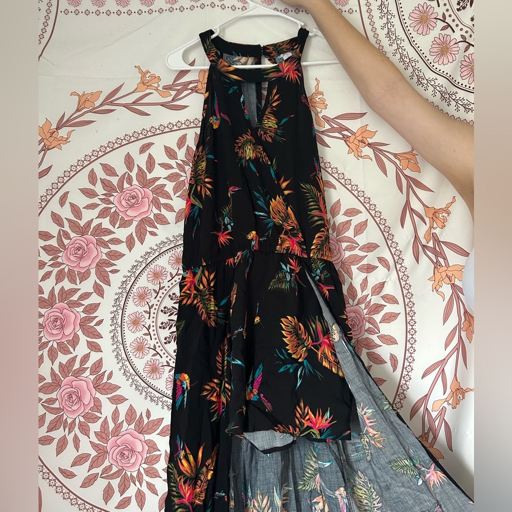 An XL black, floral, dress with a slit that opens to shorts underneath.